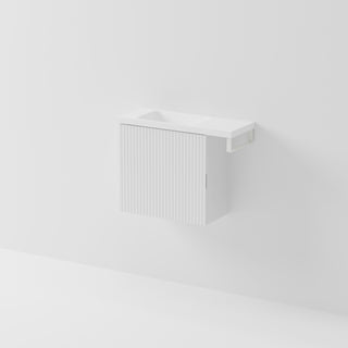 Aria 550 wall-hung WC vanity in Matte White with an offset basin and integrated Matte White hand towel rail, shown against a white background.