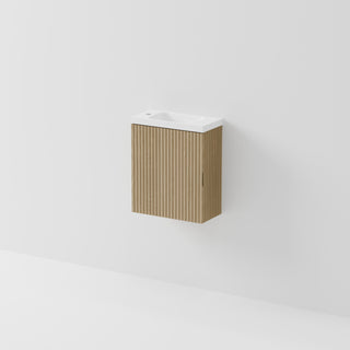 Aria 450 WC wall-hung vanity with fluted ash timber veneer in light finish, white ceramic basin - front view