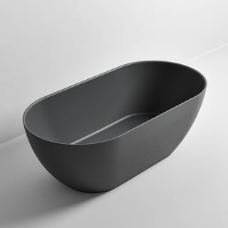 freestanding-bath-in-dark-grey-made-from-textured-solid-surface