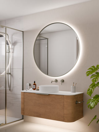 code-interiors-brushed-nickel-aura-round-led-mirror-in-bathroom-setting