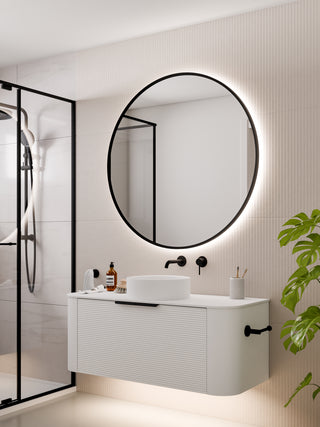 code-interiors-matte-black-aura-round-led-mirror-in-bathroom-setting