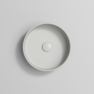 pure-round-ceramic-basin-in-matte-light-grey-with-matching-waste