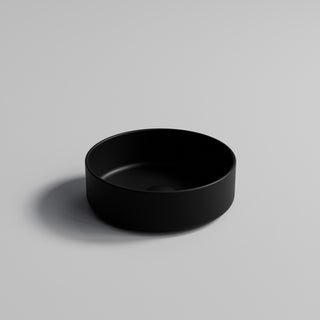 pure-round-ceramic-basin-in-matte-black-with-matching-waste