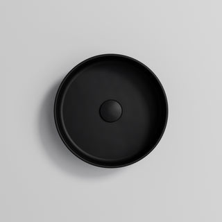 pure-round-ceramic-basin-in-matte-black-with-matching-waste
