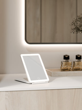 solace-travel-led-mirror-in-matte-white-in-powder-room-setting-render