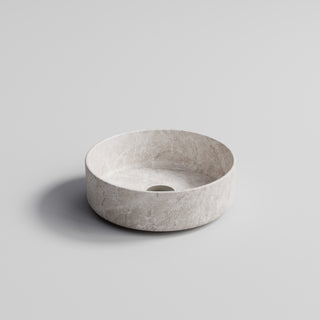 pure-ceramic-360-round-basin-travertine