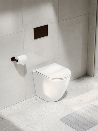code-flow-typhoon-in-the-wall-gloss-white-toilet-suite-brushed-bronze-button-tiled-wall