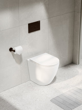 code-flow-typhoon-in-the-wall-matte-white-toilet-suite-brushed-bronze-button-tiled-wall