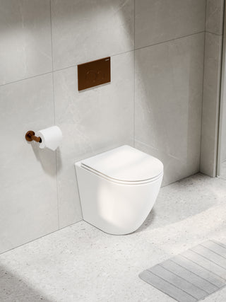 code-flow-typhoon-in-the-wall-matte-white-toilet-suite-brushed-copper-button-tiled-wall
